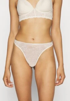 Triumph Bright Spotlight Highleg - String - Creamy Dream